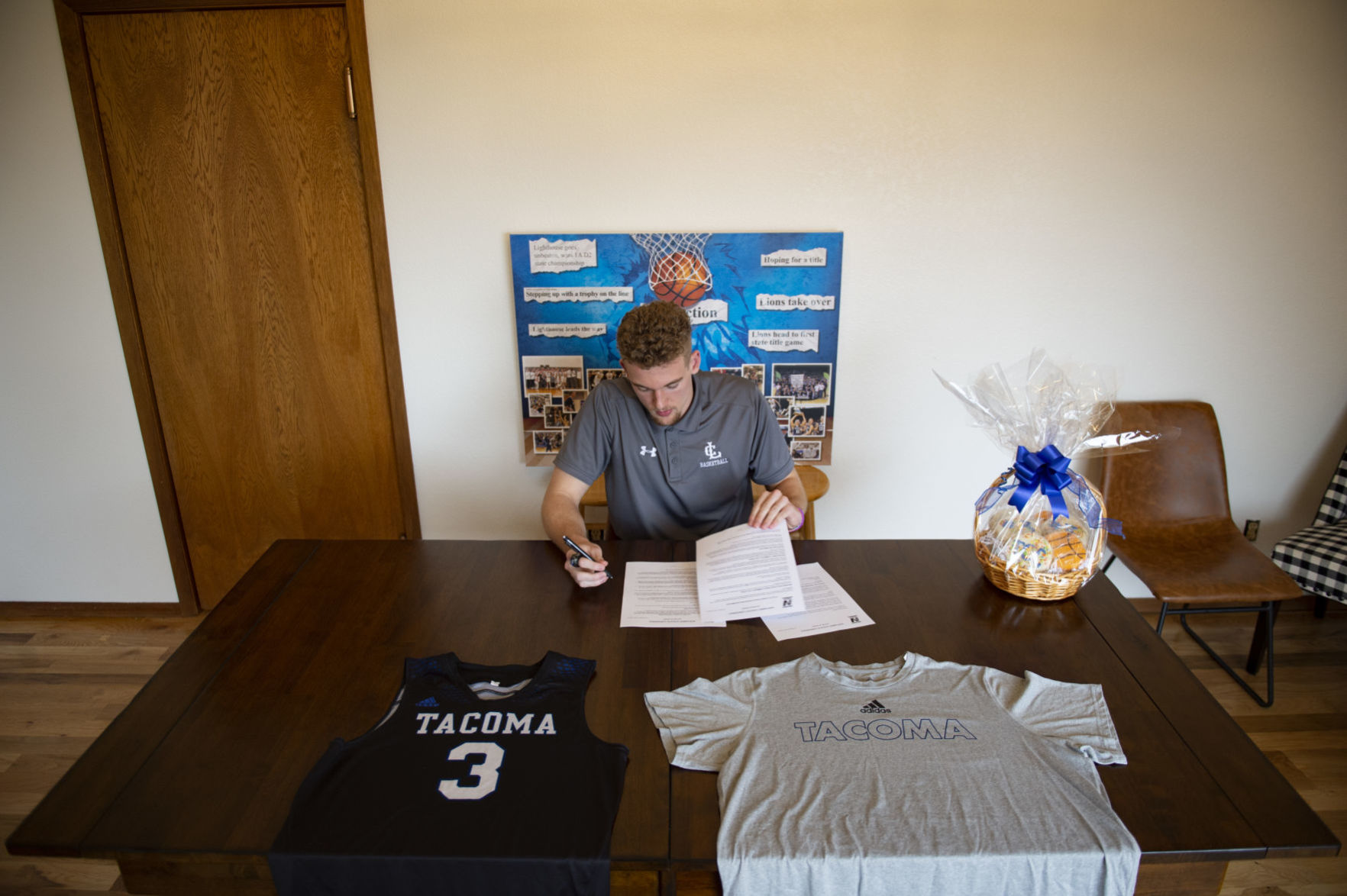 Tyler Munsee signs with Tacoma Community College